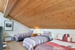 Loft has 1 Queen Bed and 2 Twin Beds
